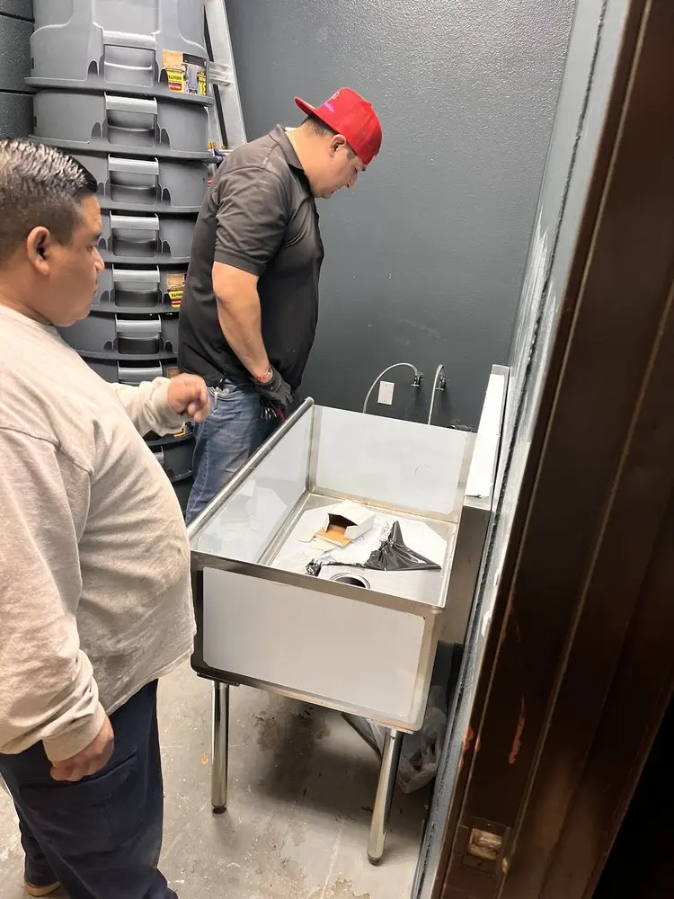 Commercial plumbing and sink installation in Noble